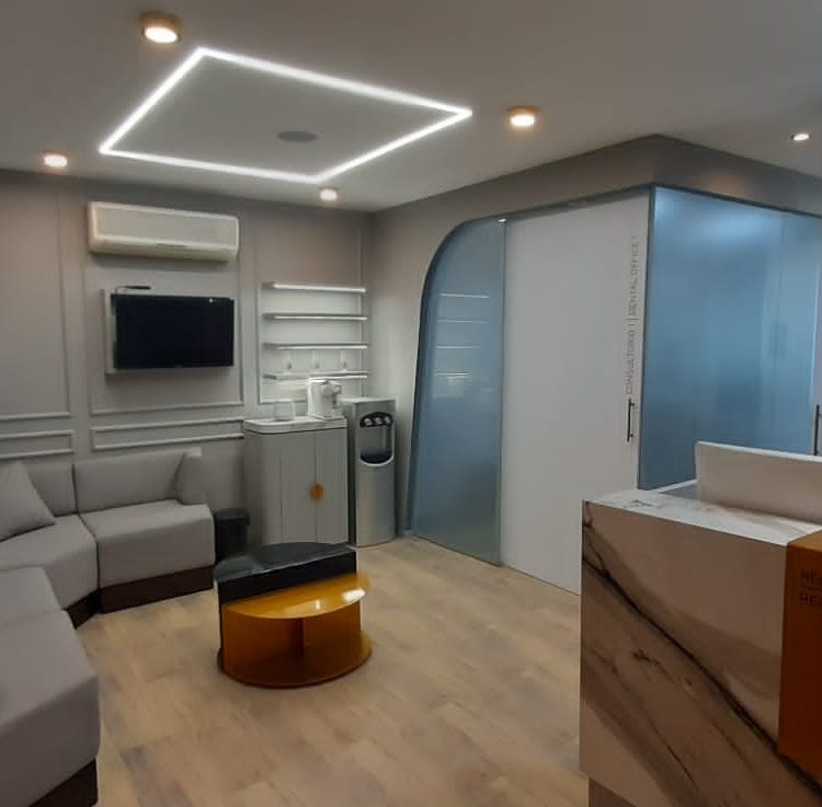 A soothing and modern dental clinic reception area designed for anxious patients, offering a calming and comfortable environment.